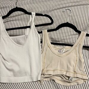 2 out from under urban outfitters tanks